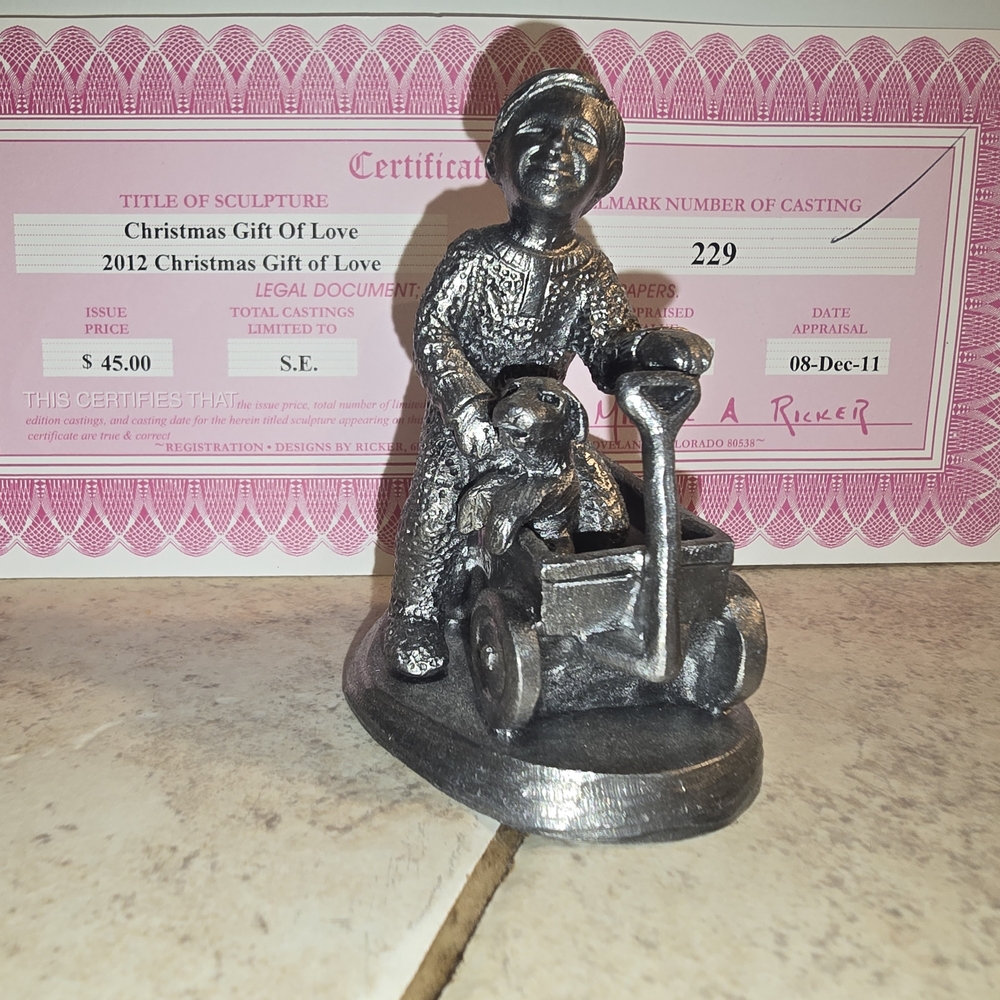 Silver Sculpture Seated Figure with Child